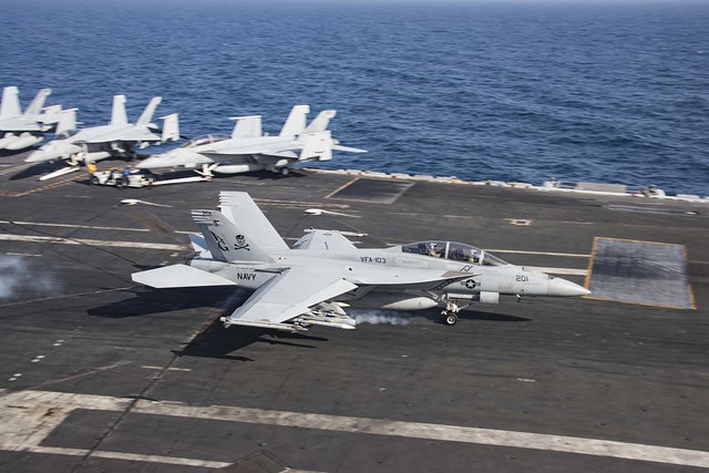 Flight operations on the flight deck of the Nimitz-class aircraft carrier USS Abraham Lincoln (CVN 72).
