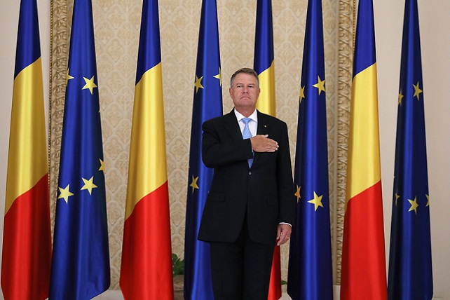 Romanian President Klaus Iohannis, flag of Romania and European