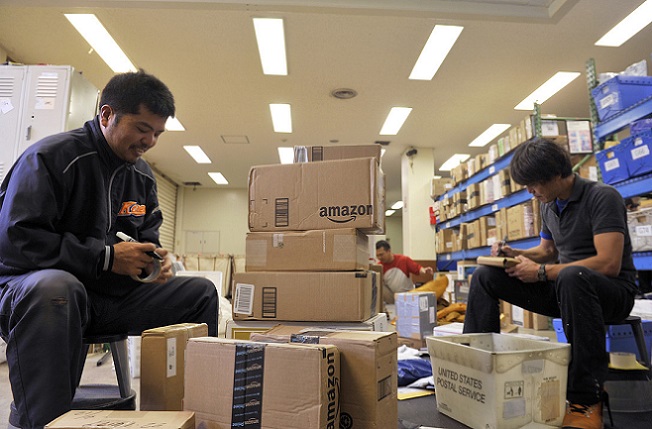 Post Office civilians distribute mail for Team Kadena