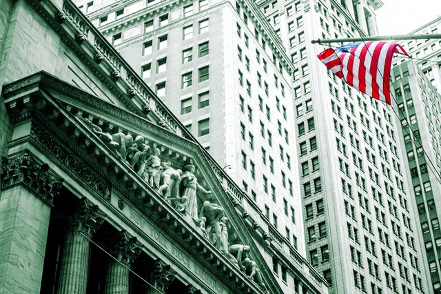 low-angle-view-of-flags-in-city-249200